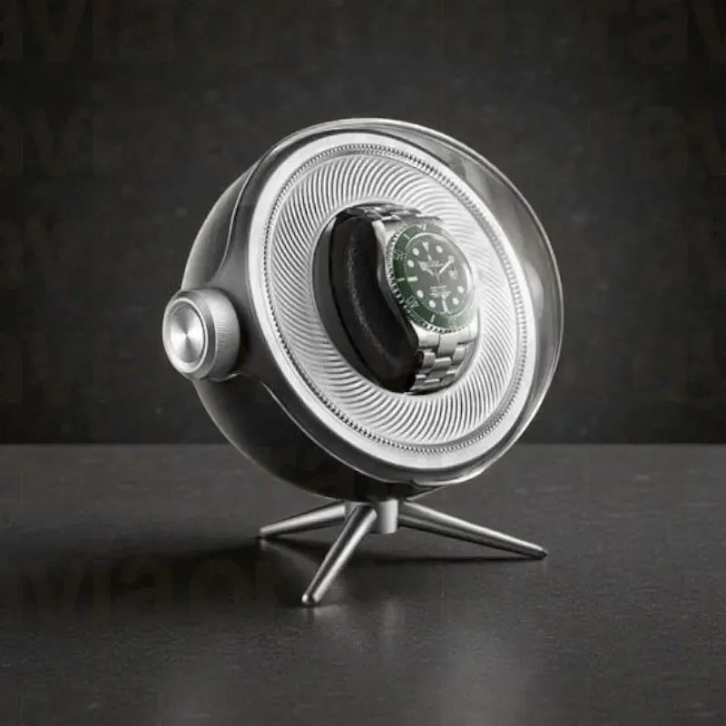 Watch in a display case on a dark background
