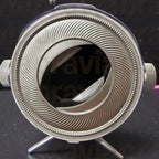 Close-up of a camera lens on a black background