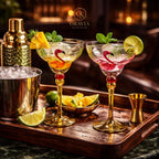 Two flamingo-themed cocktails on a wooden tray with Oravia branding.