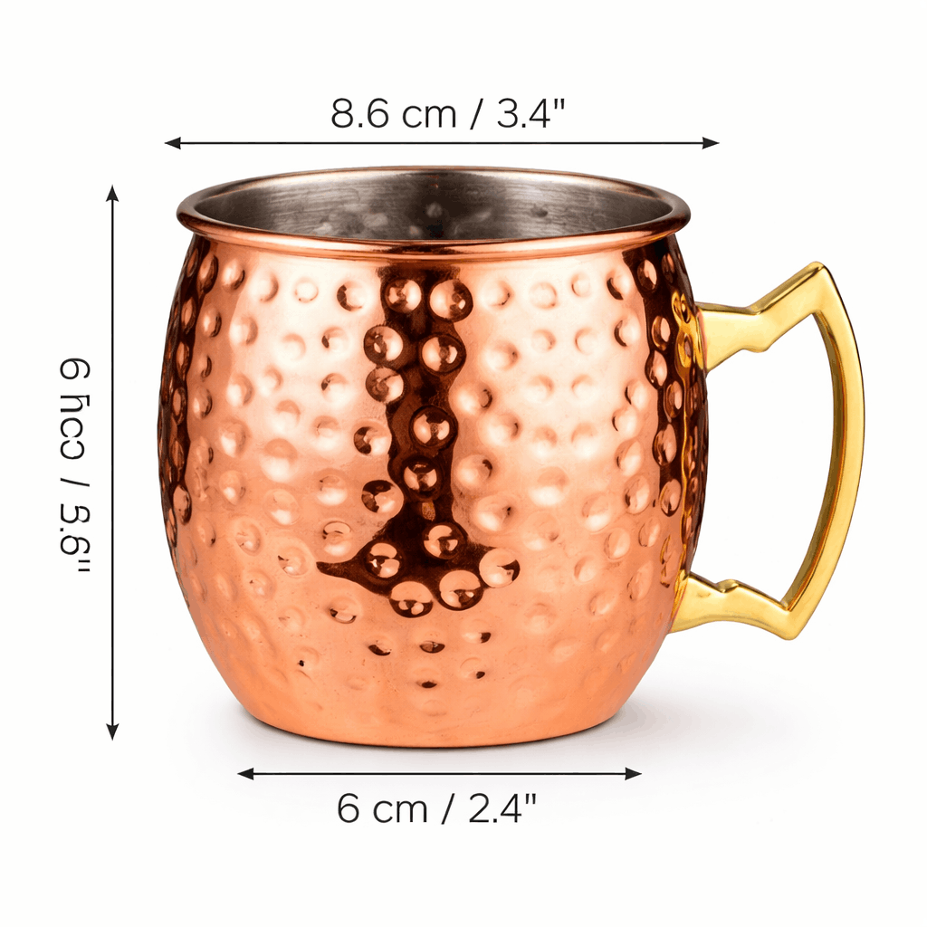 Copper mug with gold handle and dimensions labeled