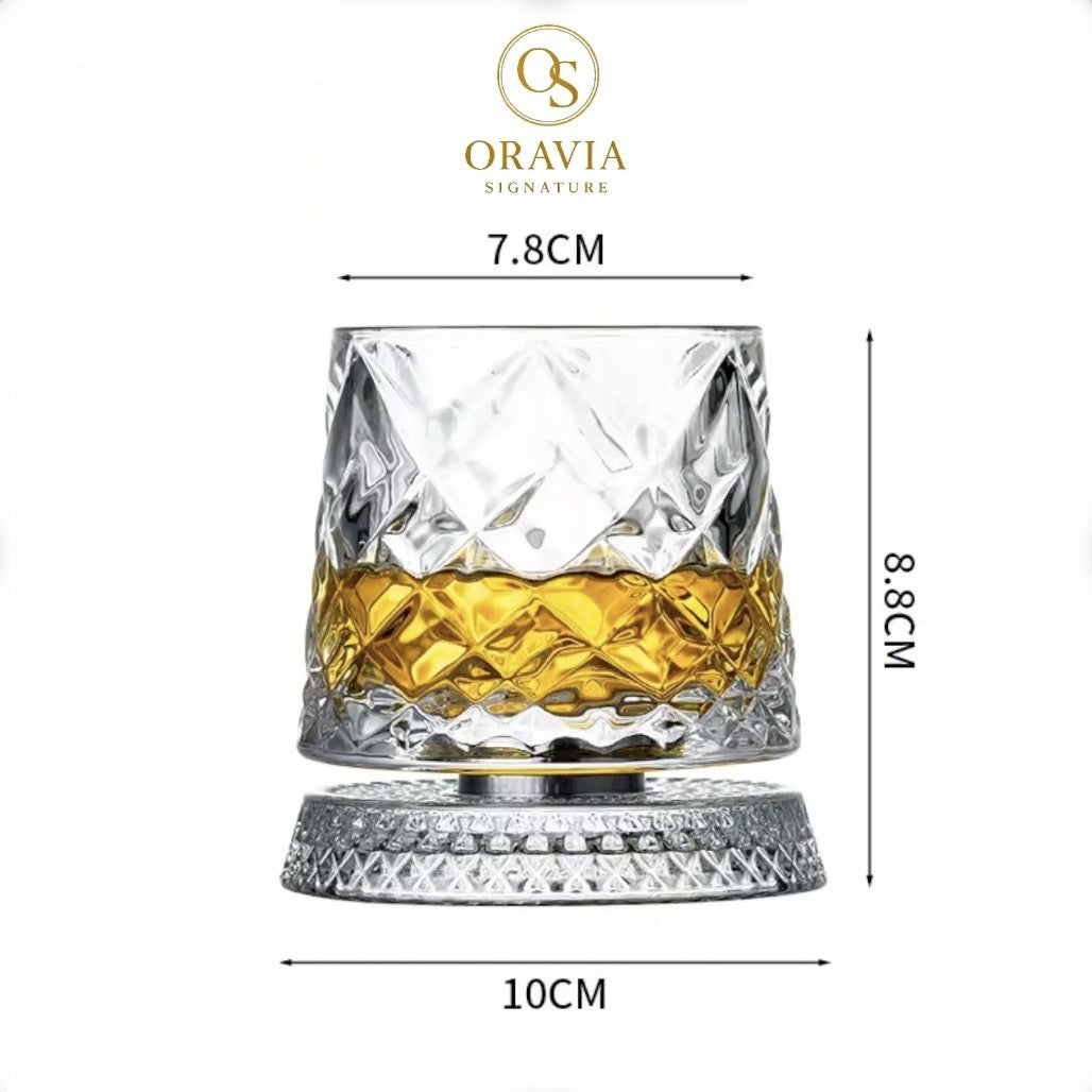 Crystal glass with dimensions and Oravia branding on a white background