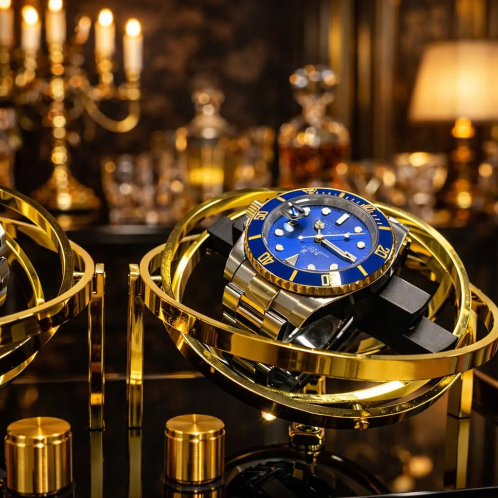 Luxury gold watch with blue face on a decorative  watch winder stand in an elegant setting.