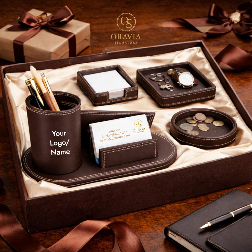 Oravia branded desk set with customizable logo on a wooden surface