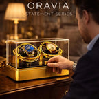 a gold watch display case featuring Oravia  signature watch winders.
